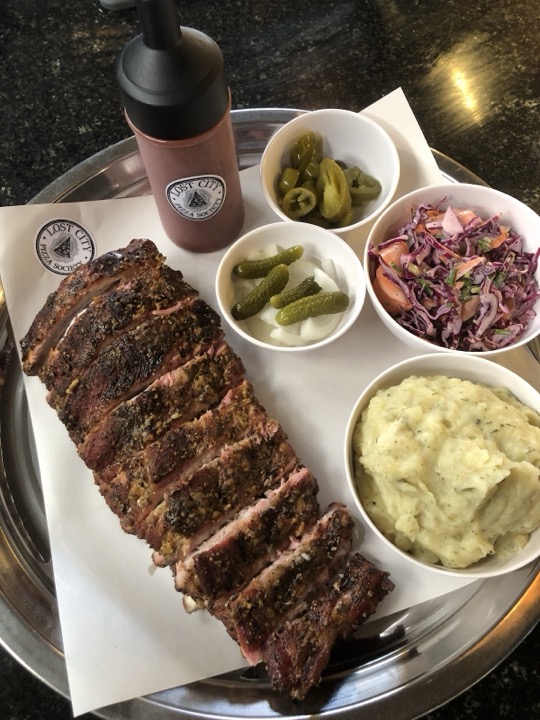 Smoked ribs with slaw, pickles and mash at Lost City Pizza Society