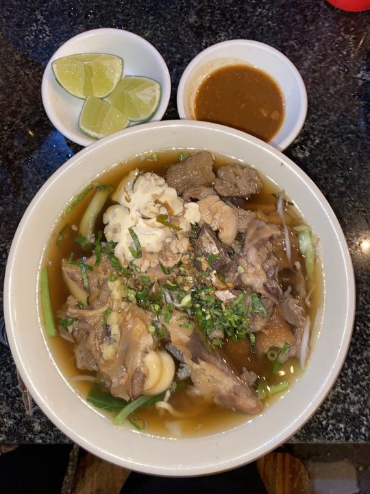 Beef hoof soup with bones and tendon
